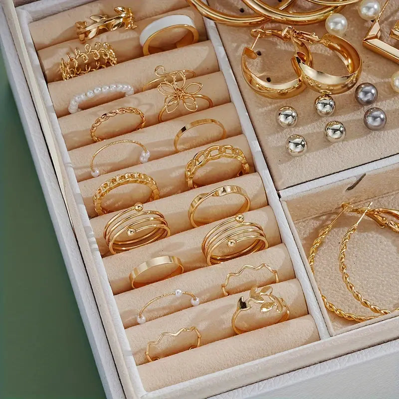 Display of multiple rings and earrings for women.