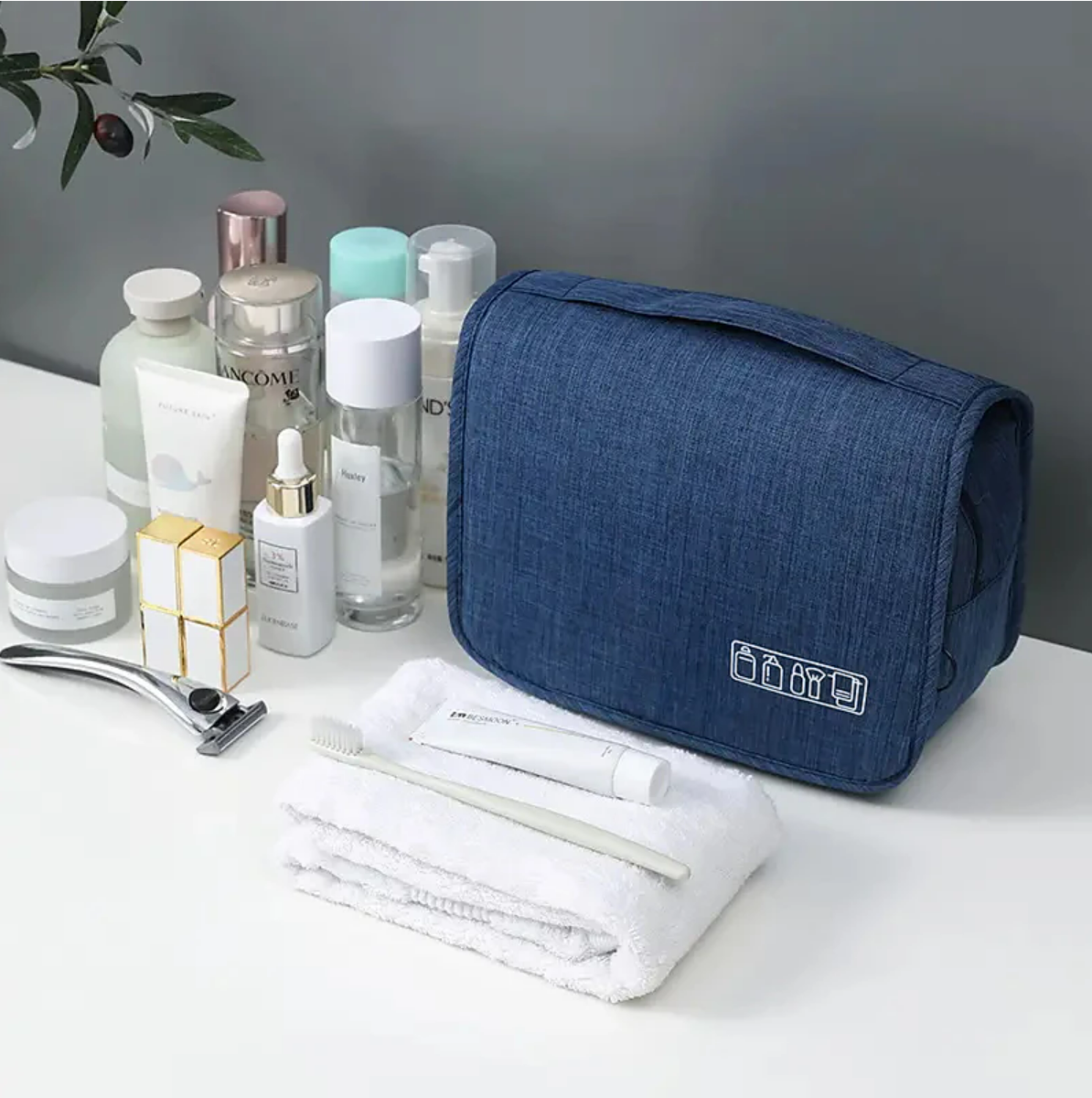 Compact folded hanging toiletry bag, ready for packing.