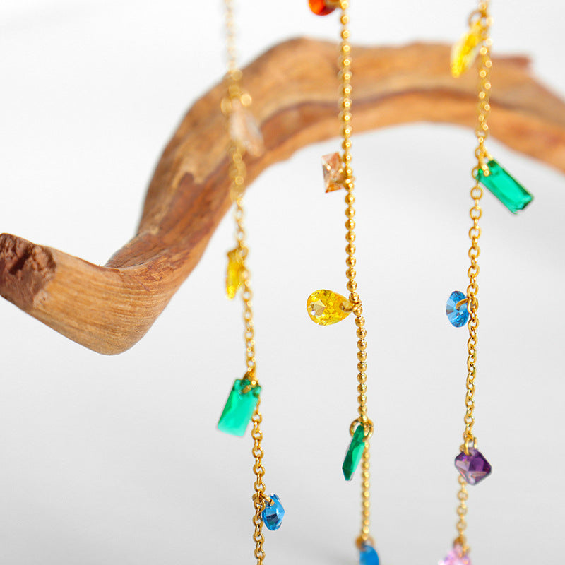 Detailed view of multi-color zircon stones in the bracelet.