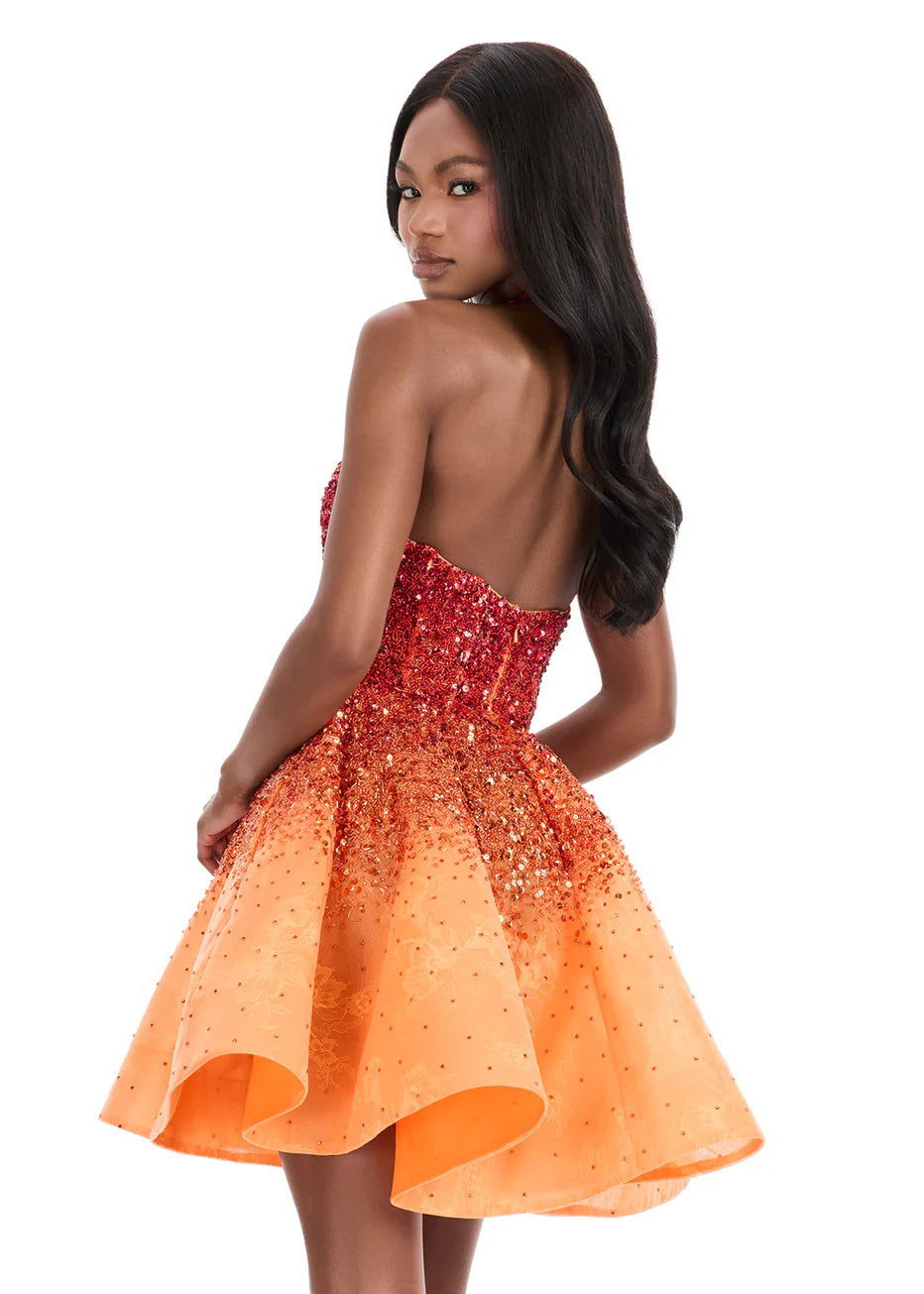 Close-up of the shimmering gradient sequin bodice and halter sweetheart neckline of the dress.