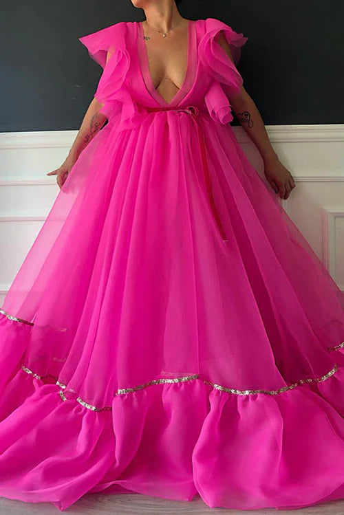 Vibrant hot pink plunge-neck ruffled organza ball gown.