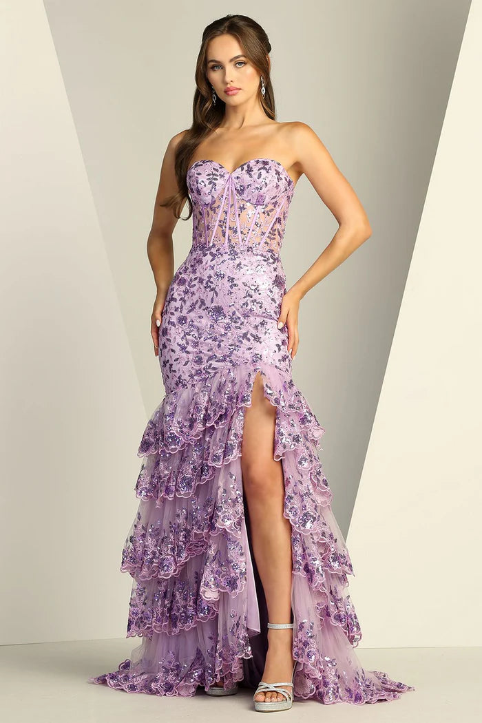 Back view of fuchsia sequin mermaid gown with ruffled train.