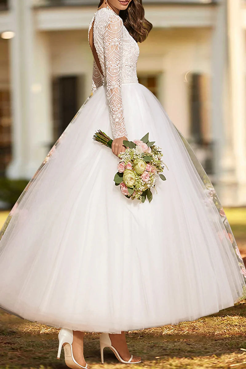 Elegant knee-length bridal gown with vintage style.