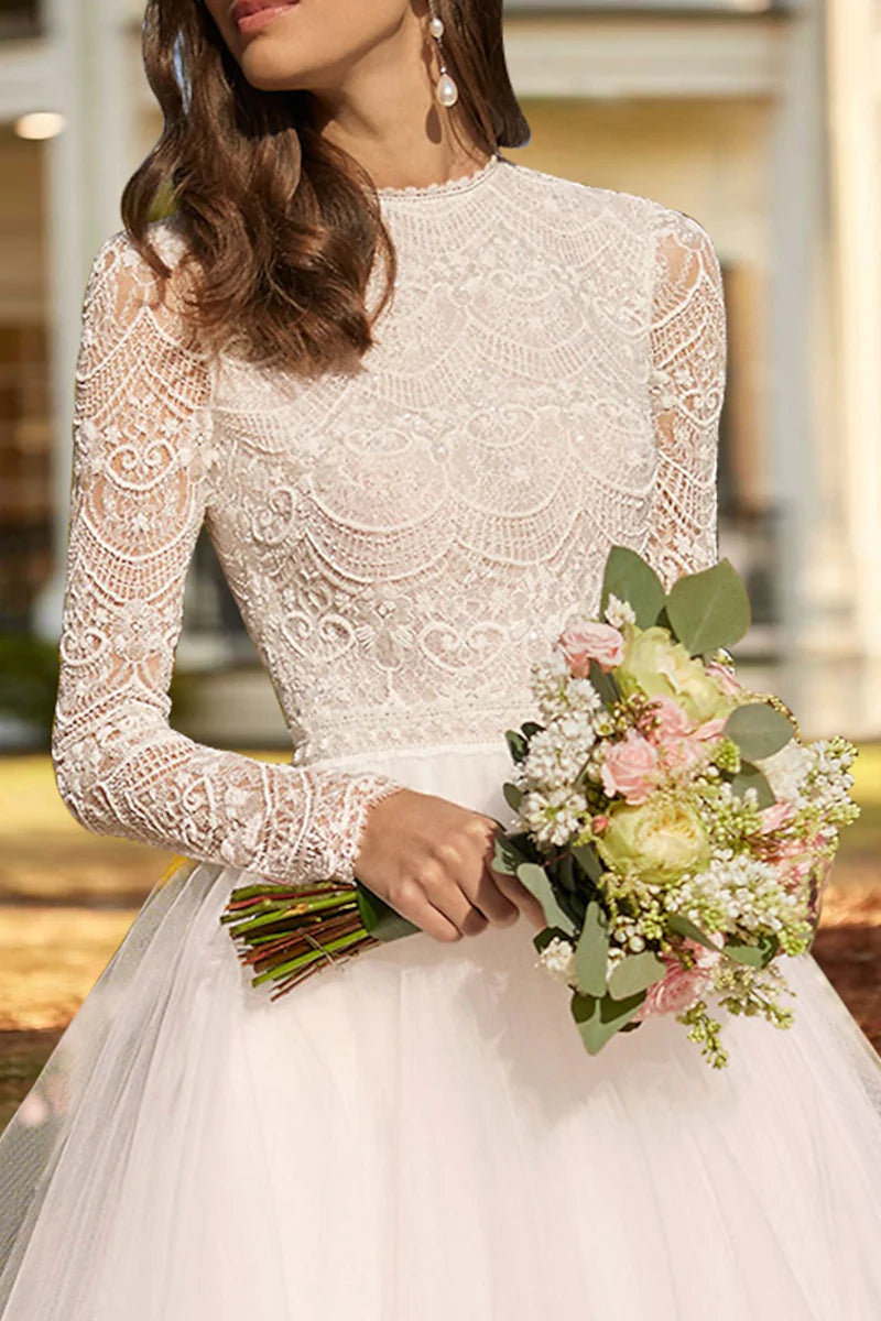 Timeless vintage-inspired knee-length wedding dress.