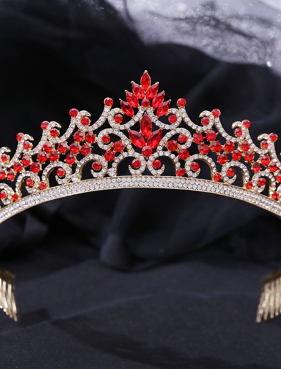 Colorful baroque crown with intricate gemstone design.