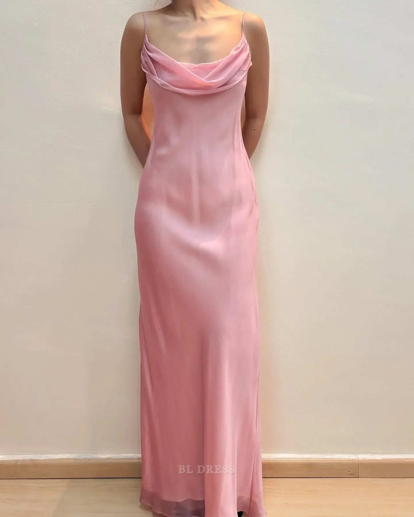 Pink chiffon sheath dress with spaghetti straps and V-neck, front view.