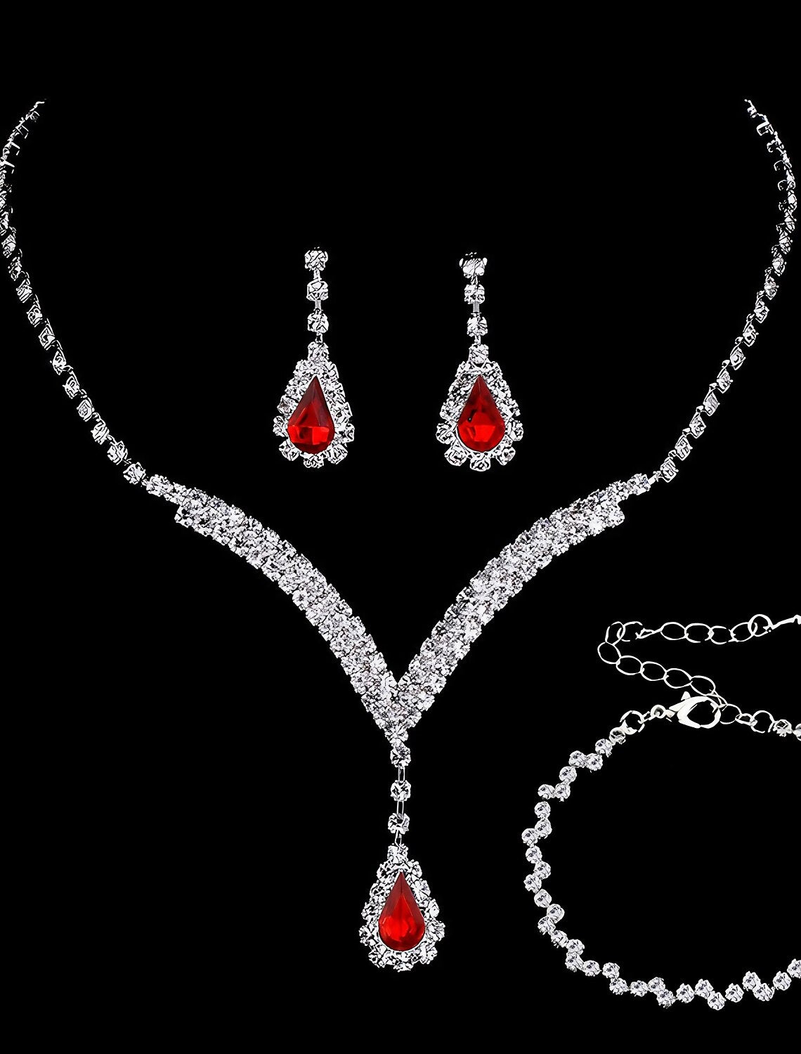 Vintage rhinestone bridal jewelry set with necklace, bracelet, and earrings.