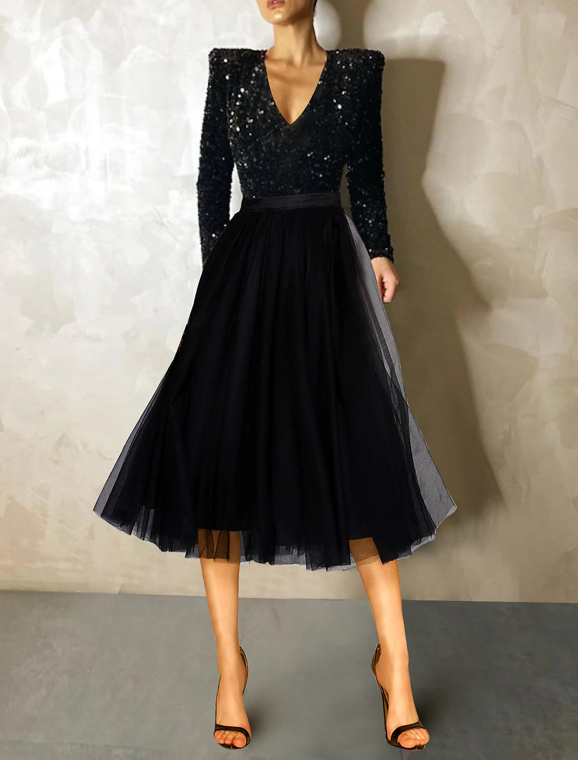 Side view of the sequin tulle A-Line Ball Gown, showcasing its tea length.