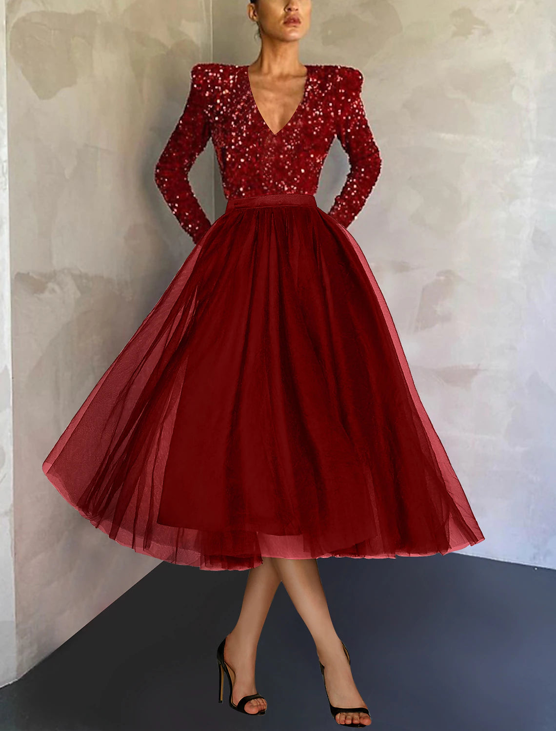 Close-up detail of the shimmering sequin and delicate tulle fabric on the dress.