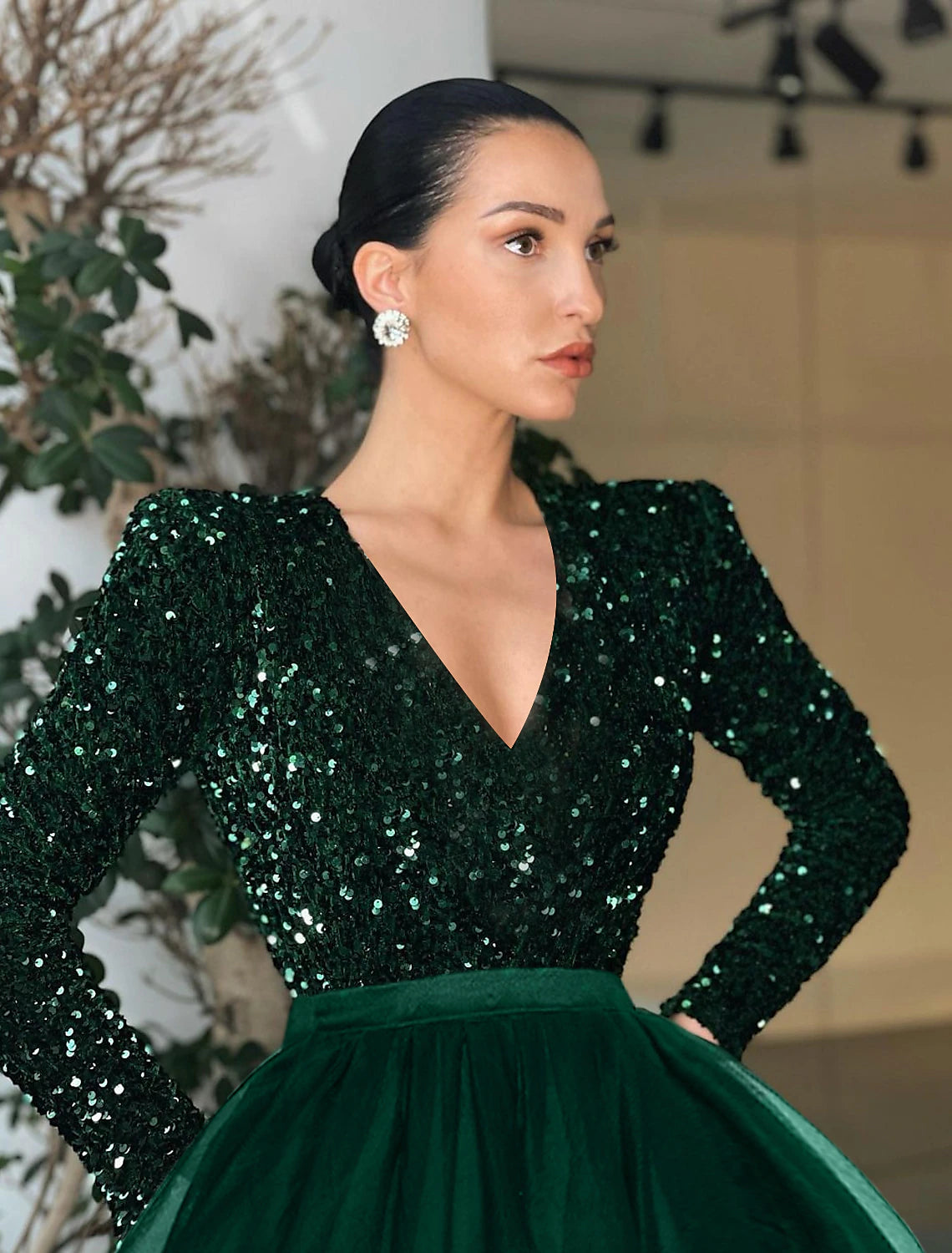 Back view of the vintage-inspired long sleeve jewel neck gown.