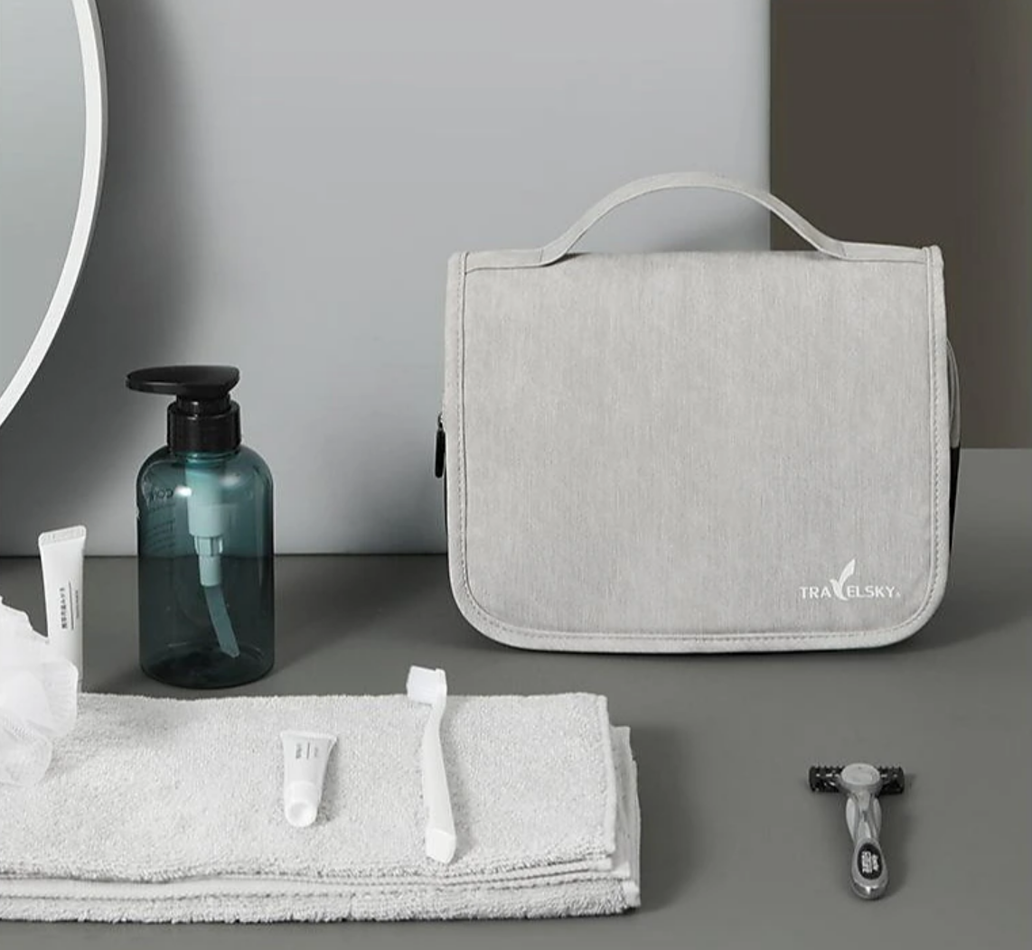 Toiletry bag with a side view, highlighting its capacity for full-sized items.