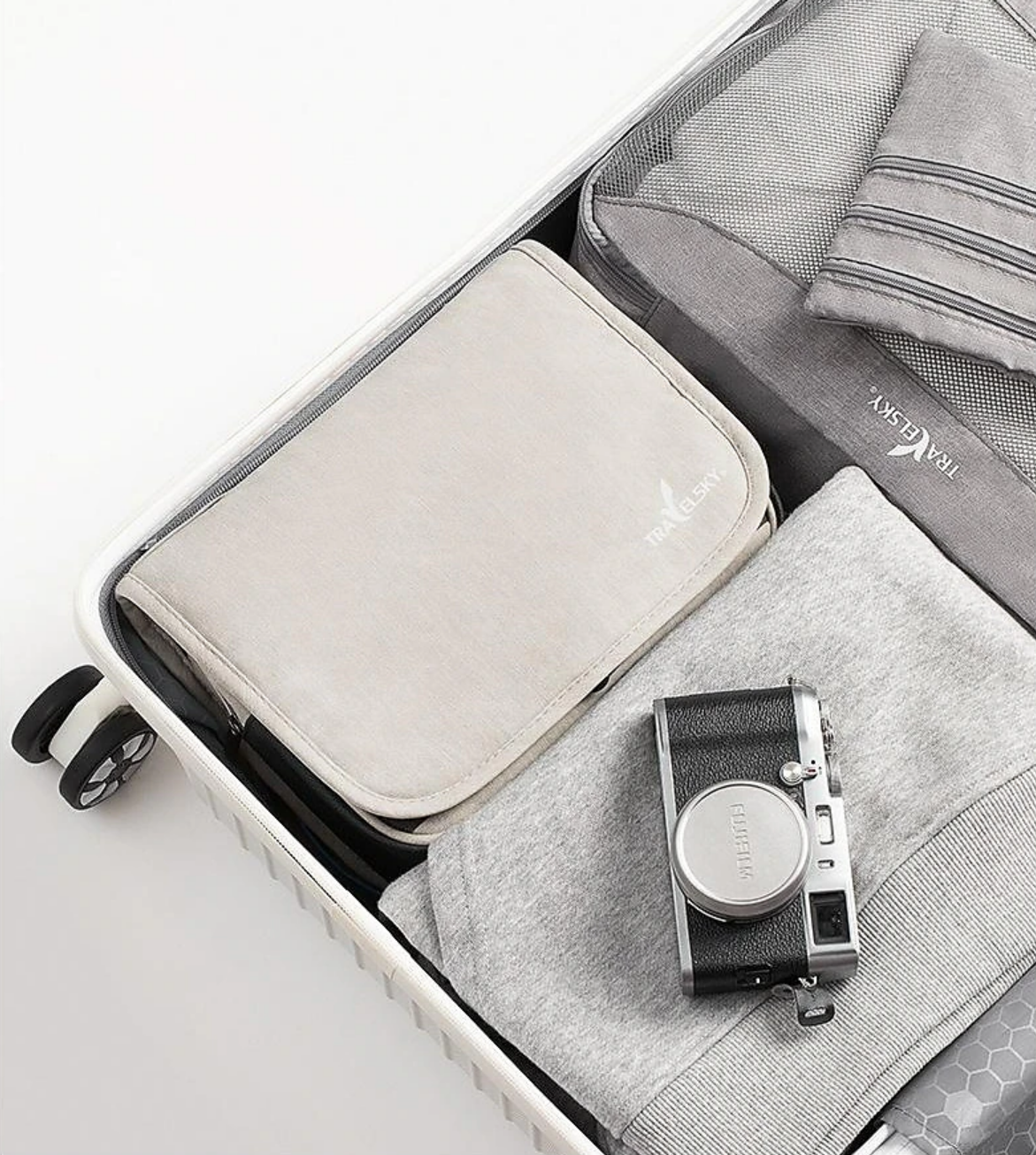 Hanging toiletry bag in a bathroom setting, showing easy access to items.