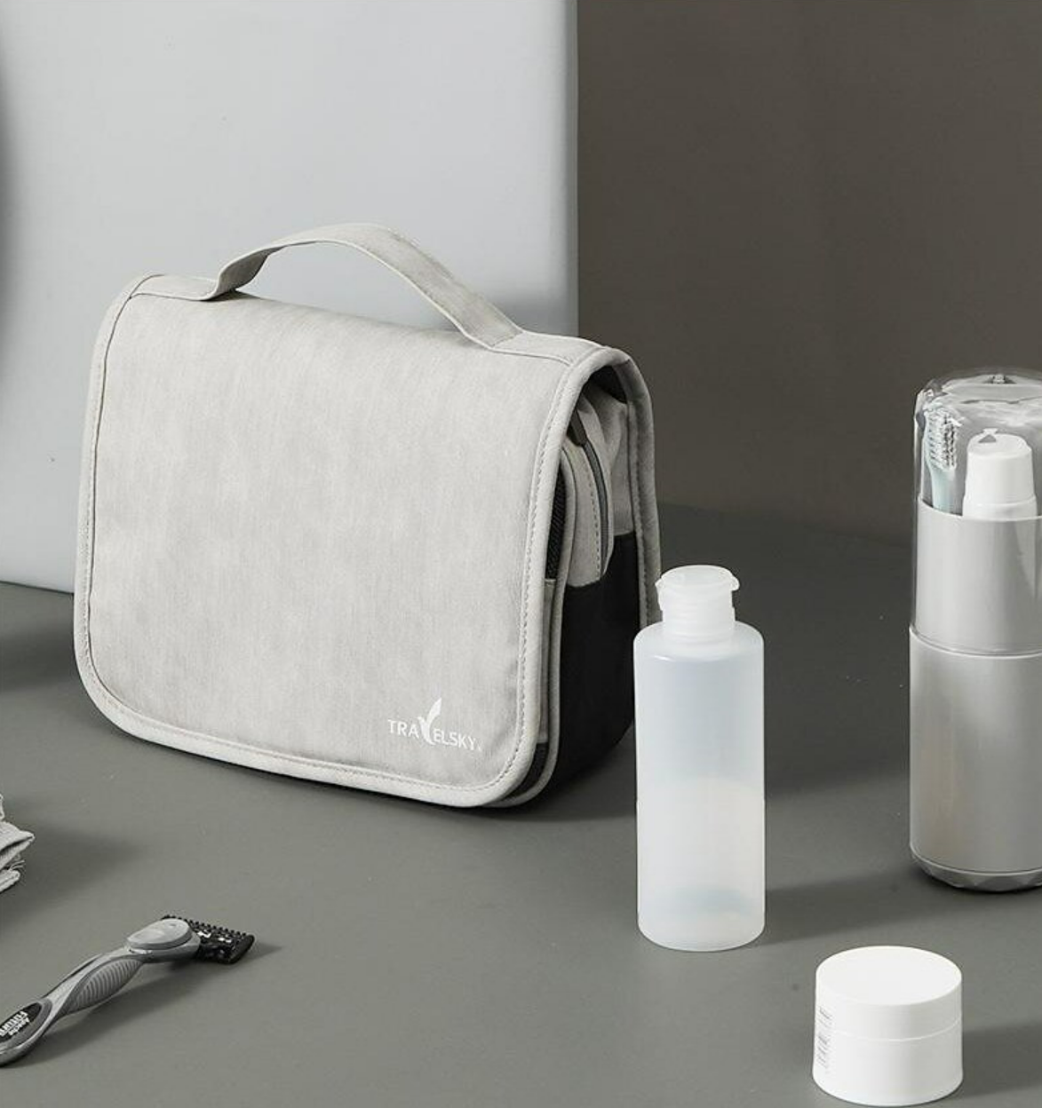 Detailed view of the toiletry bag's interior pockets and mesh compartments.