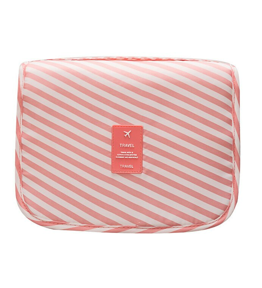 Large capacity toiletry bag hanging from a hook.