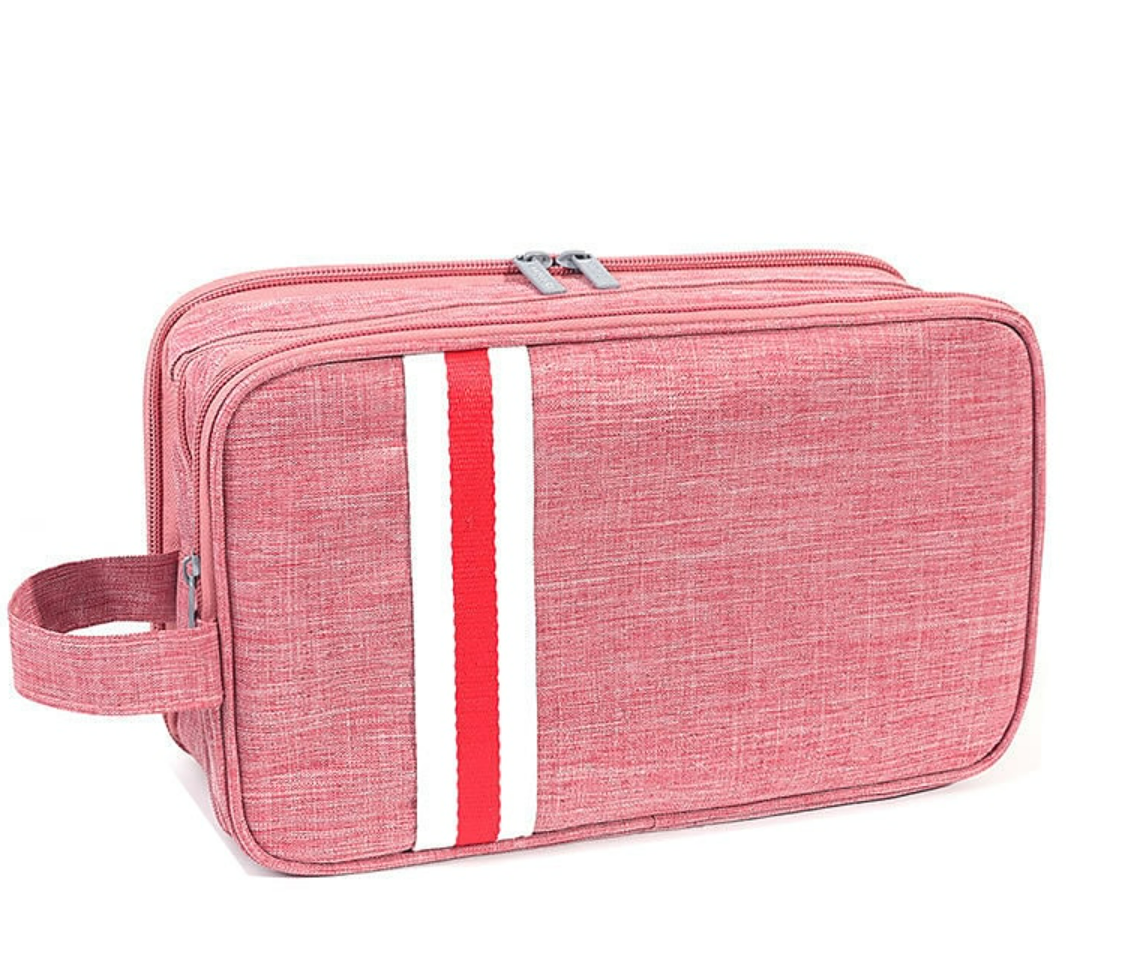 Compact waterproof toiletry bag, folded for easy packing.