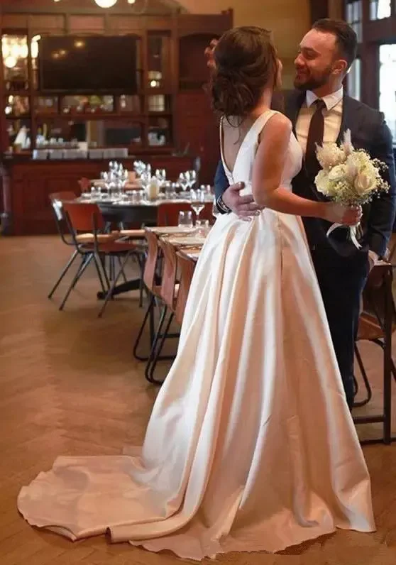Wedding Dress White Sleeveless A Line Satin Gown With Bow Accent And V Back Formal Bridal Gown