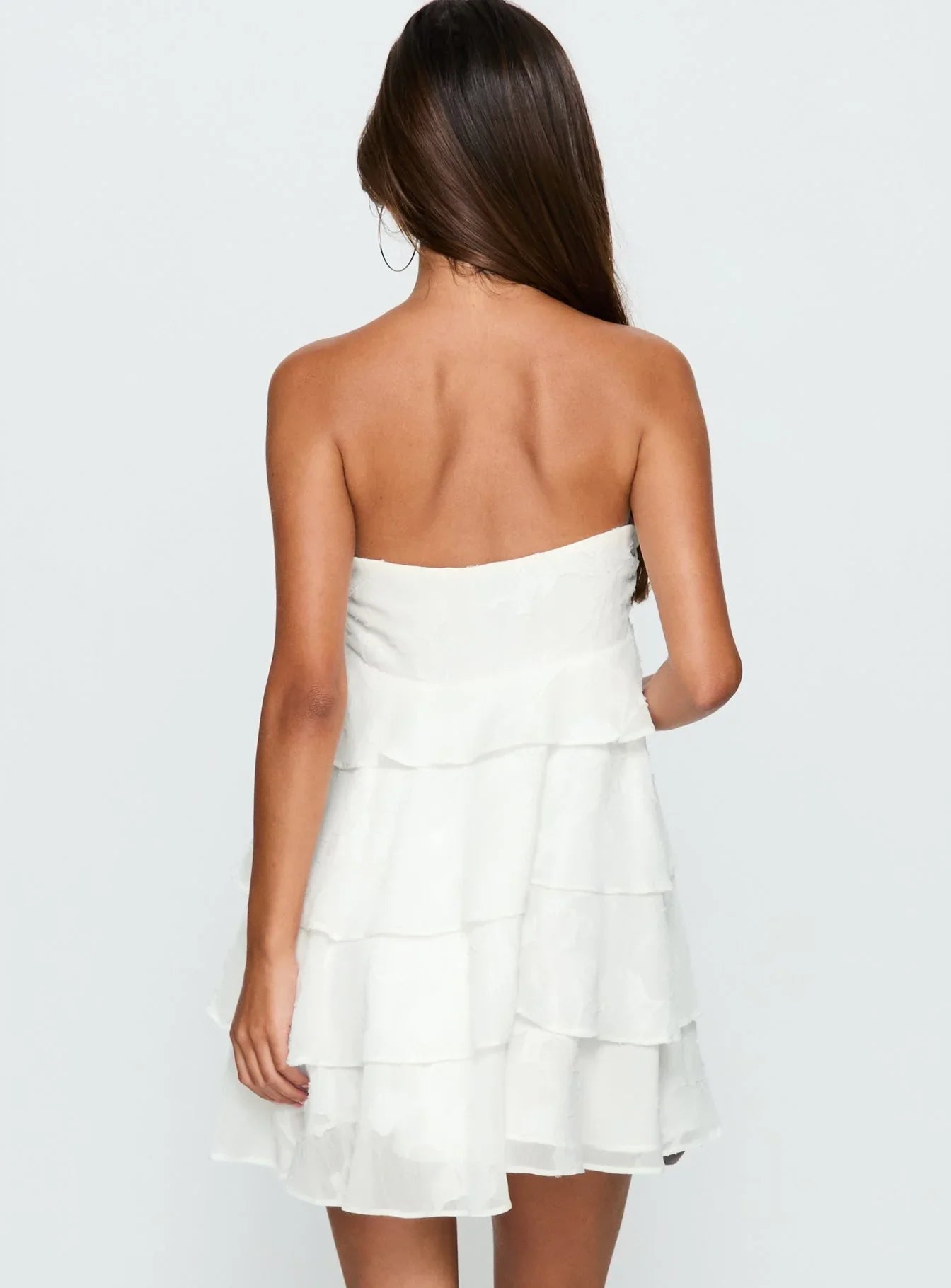 White Strapless Homecoming Dress with Tiered Ruffled Skirt and Bow Detail for Formal Events and Homecoming Nights