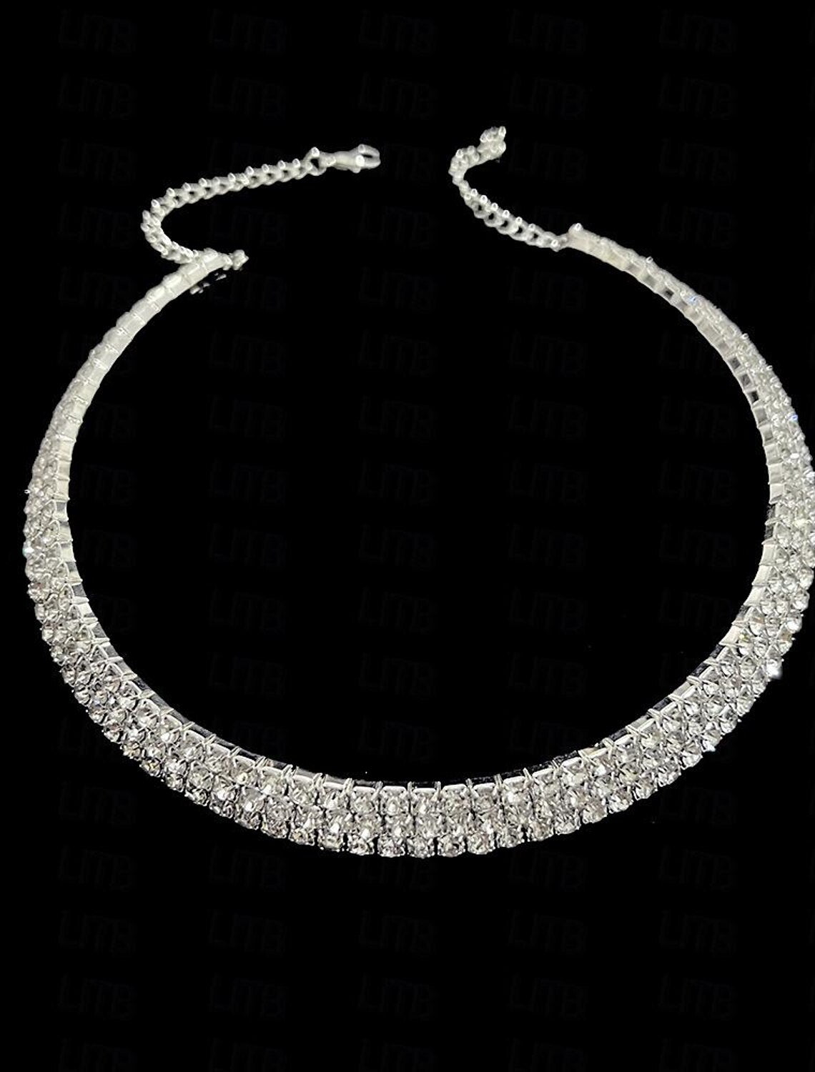 Women's alloy jewelry set with flower and pear-round designs, including necklace, earrings, and bracelet.