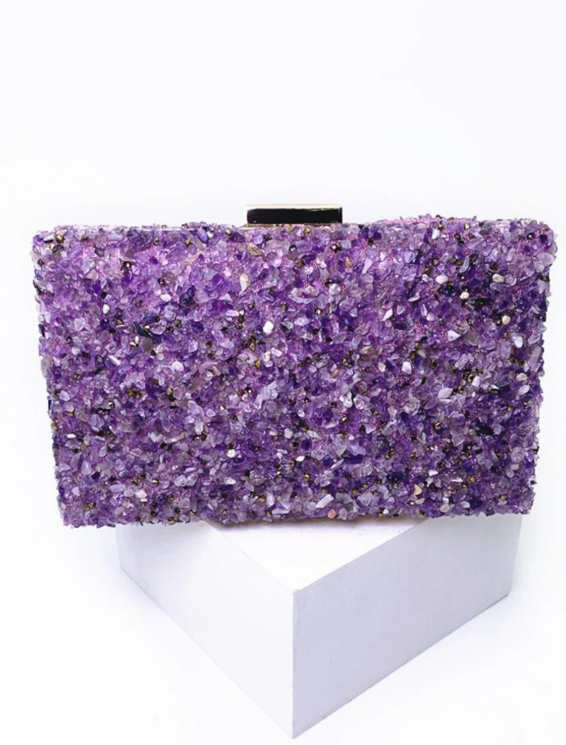 Close-up of the color block design on an evening bag.