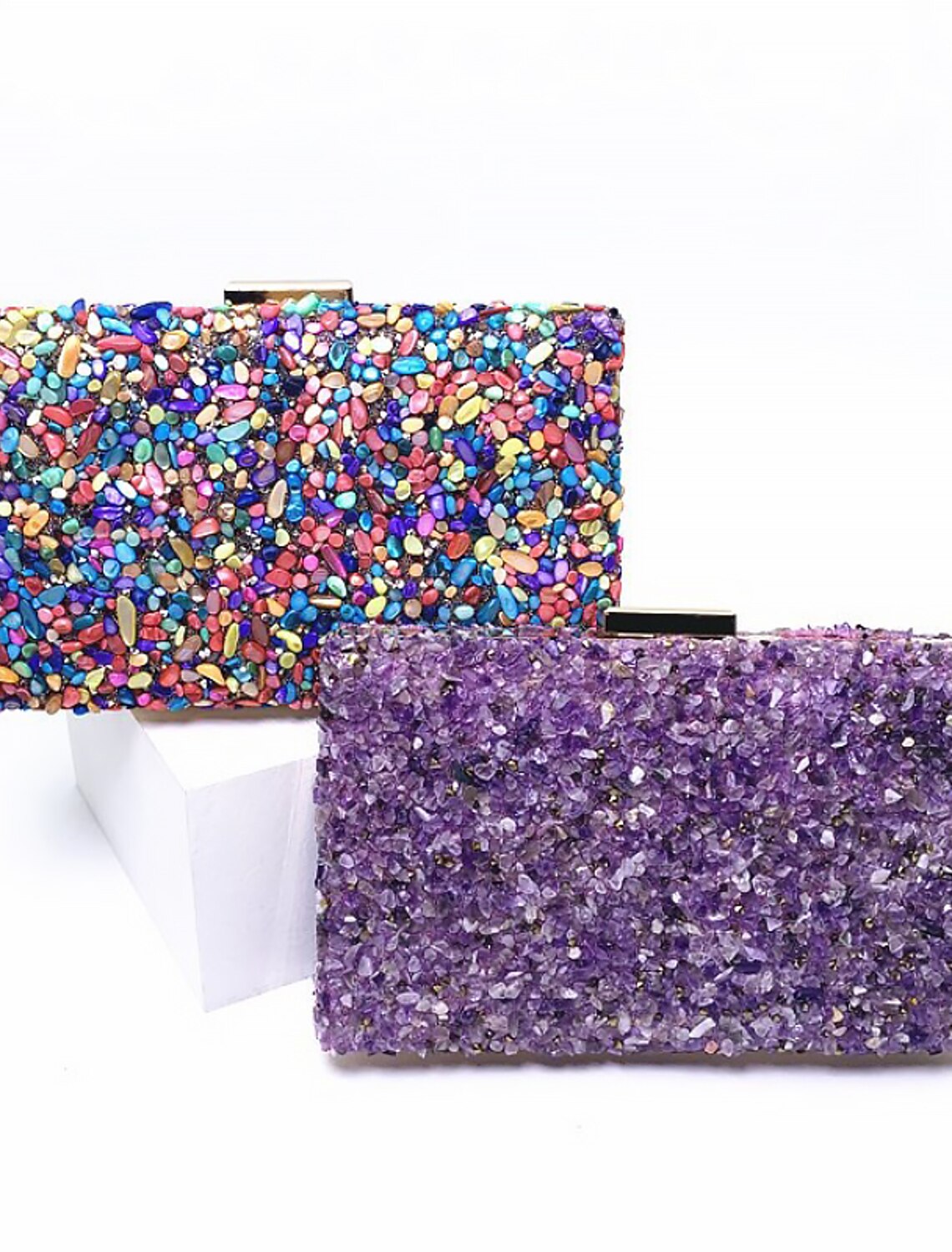 Women's evening bag with color block design, showcasing its lightweight form.