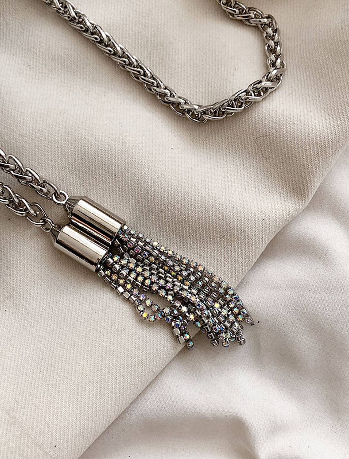 Crystal evening clutch bag paired with a sophisticated formal outfit.
