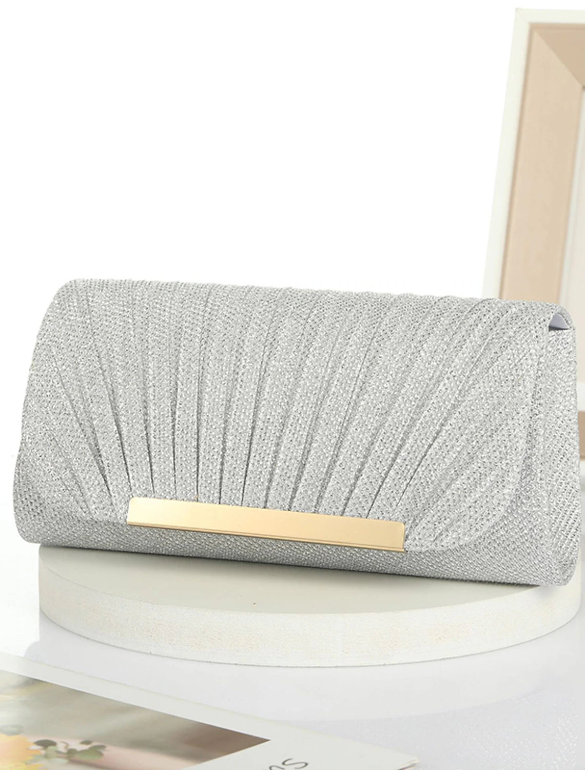 Elegant women's clutch bag adorned with crystals.