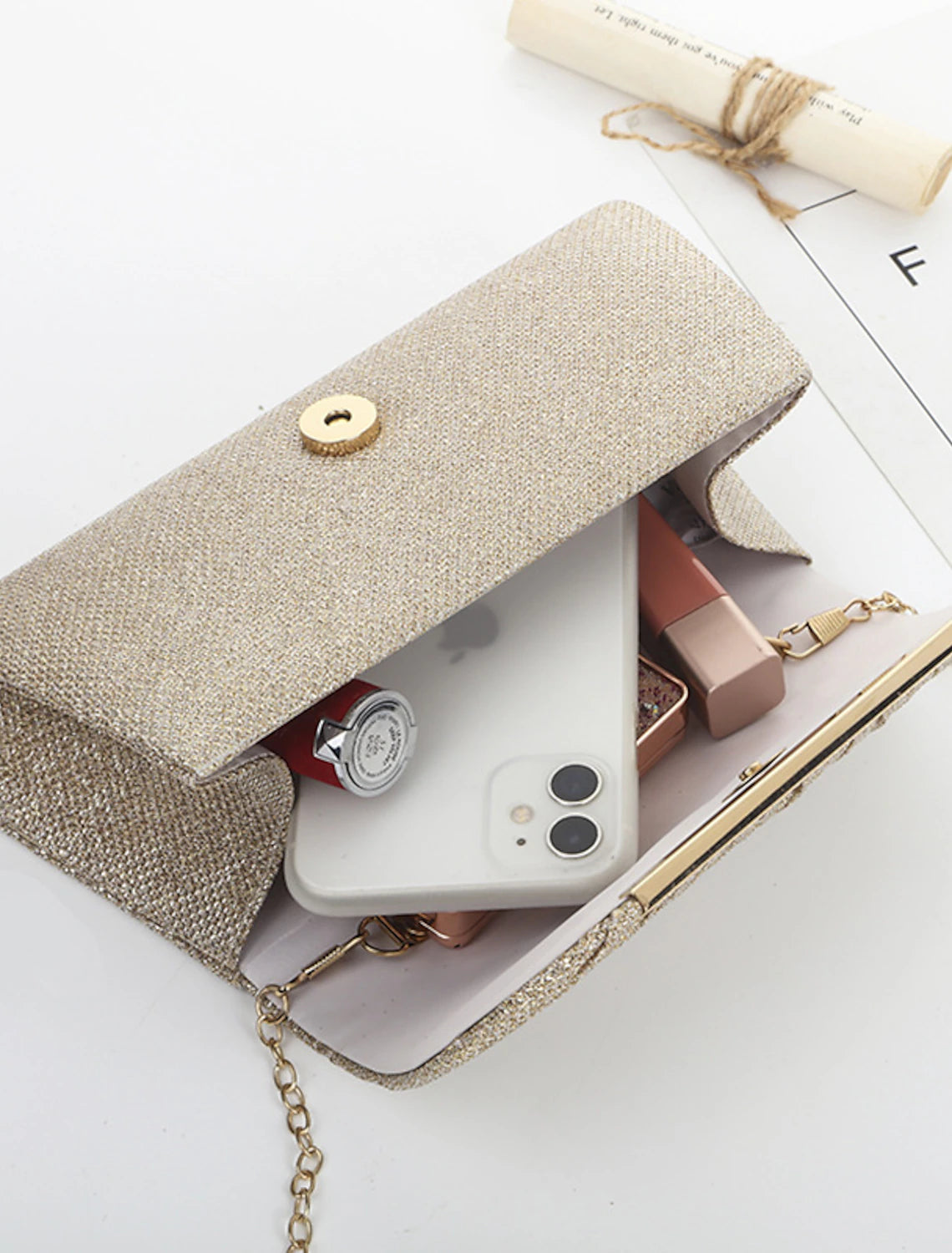Stylish evening clutch with a shimmering crystal design.