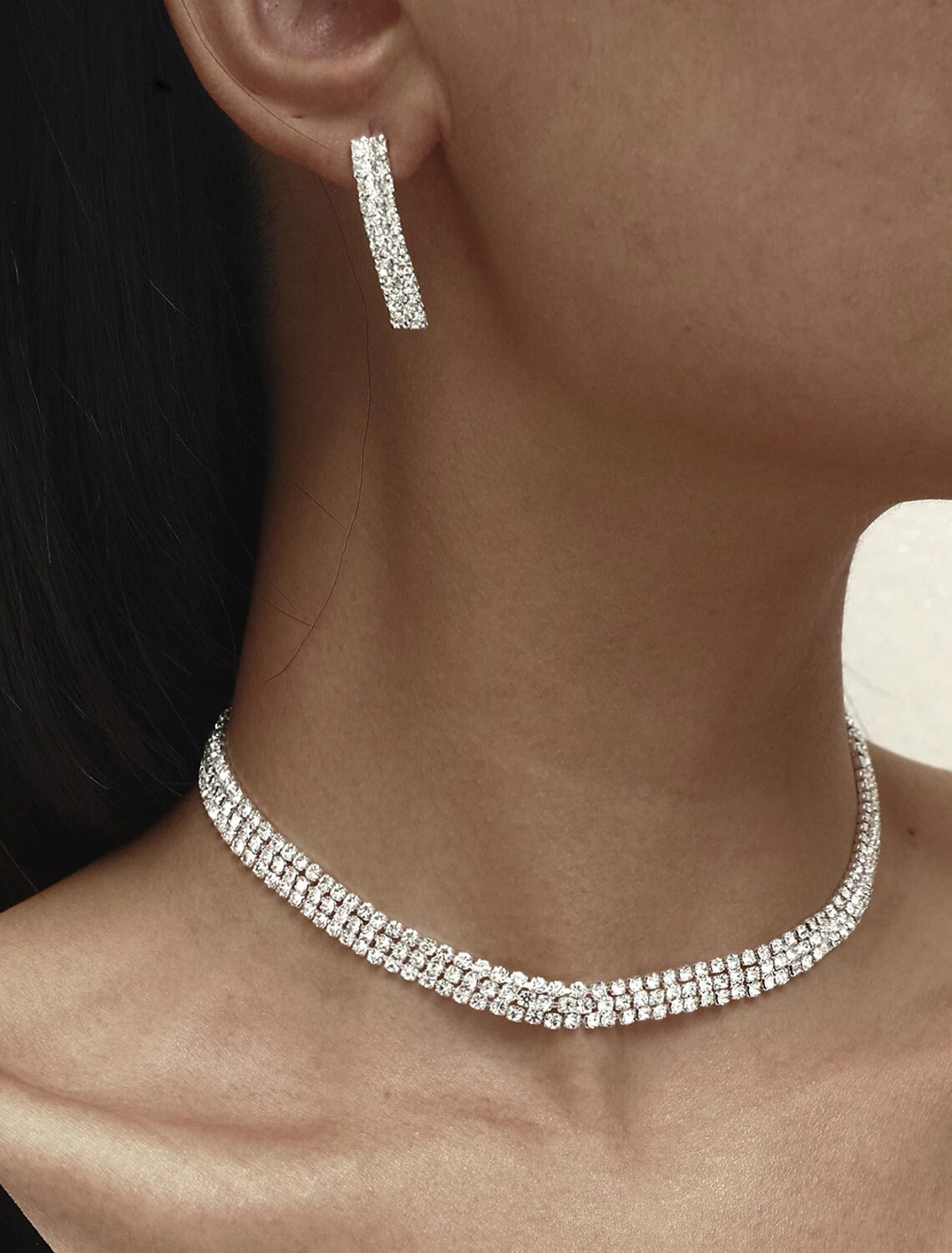Close-up of the imitation diamond necklace and earrings set.