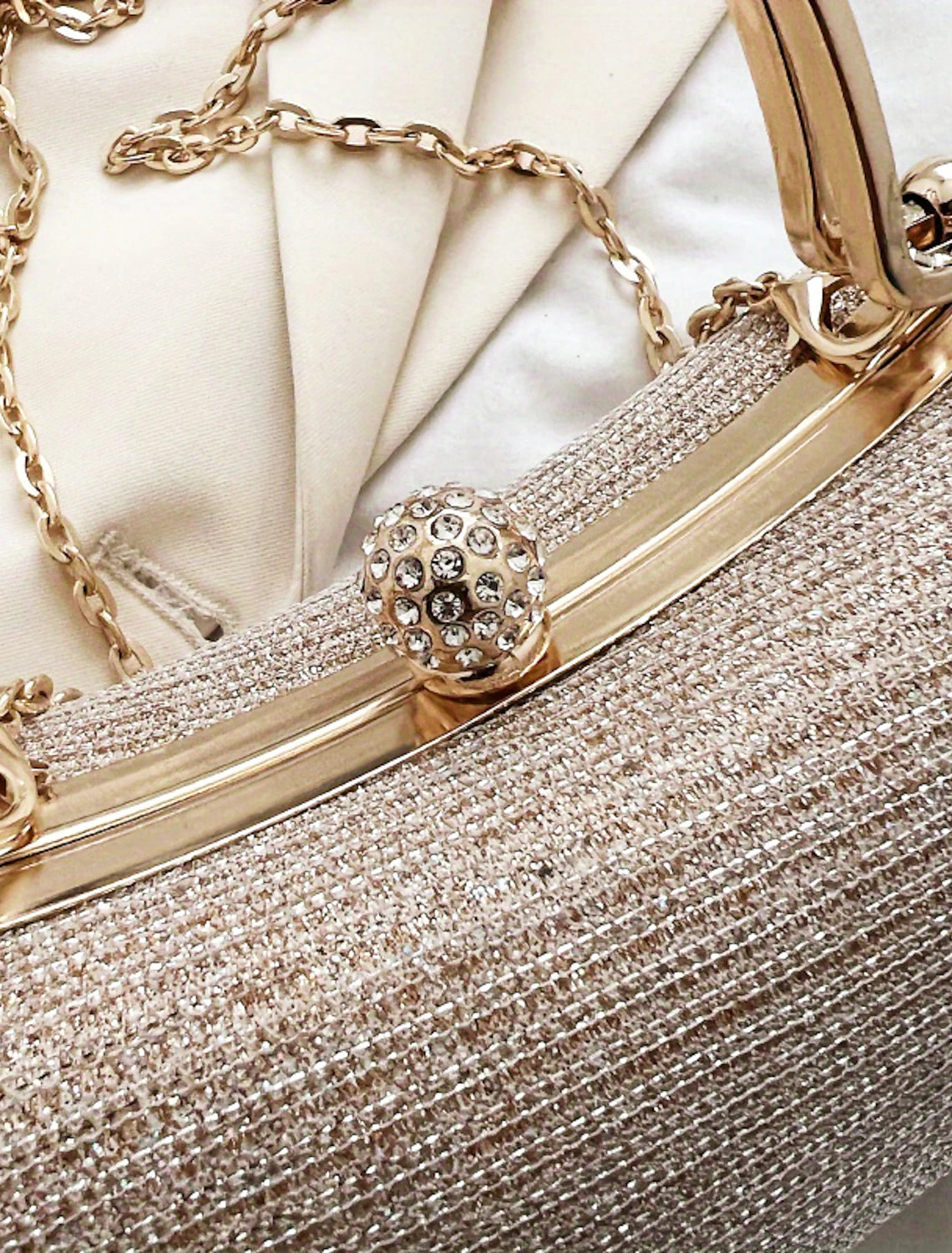 Women's party clutch bag on a table setting.