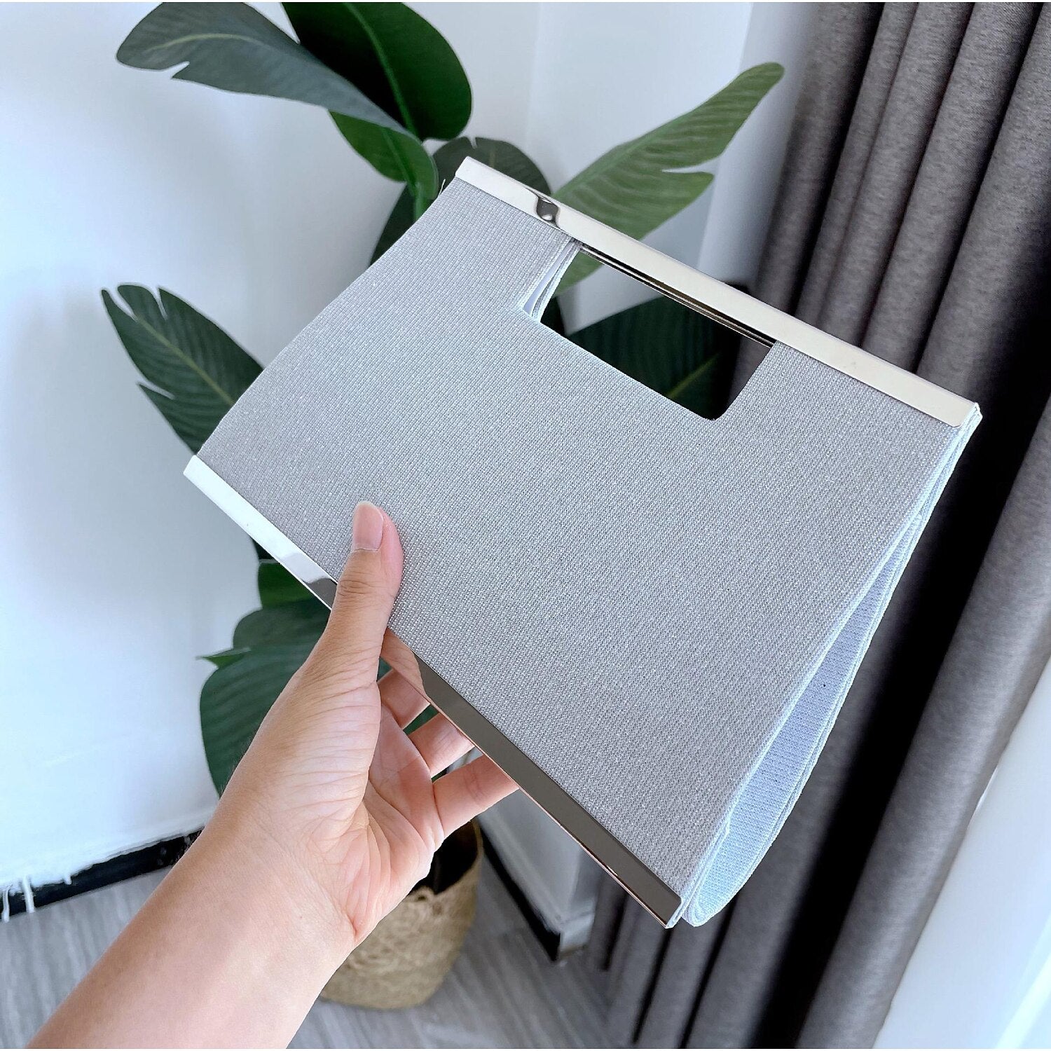 Elegant synthetic clutch evening bag.