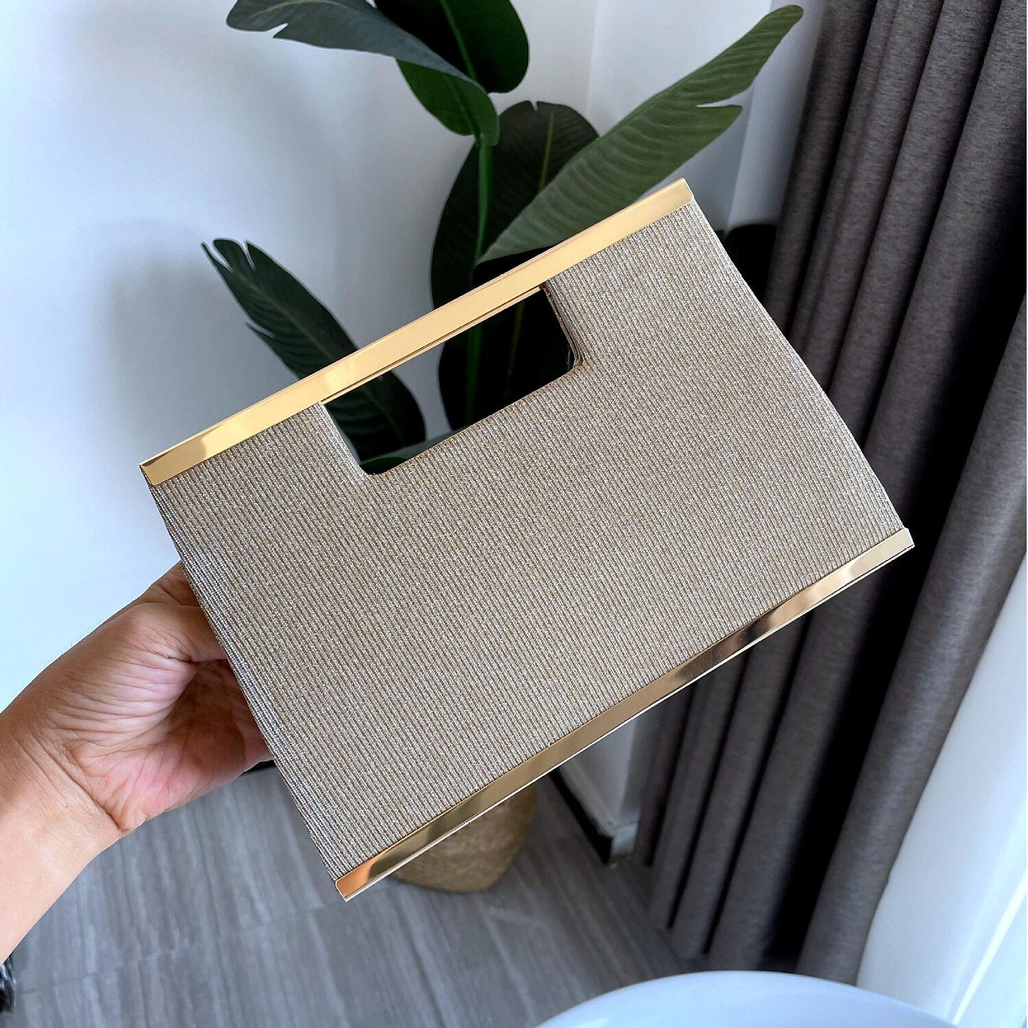 Side profile of a durable women's clutch.
