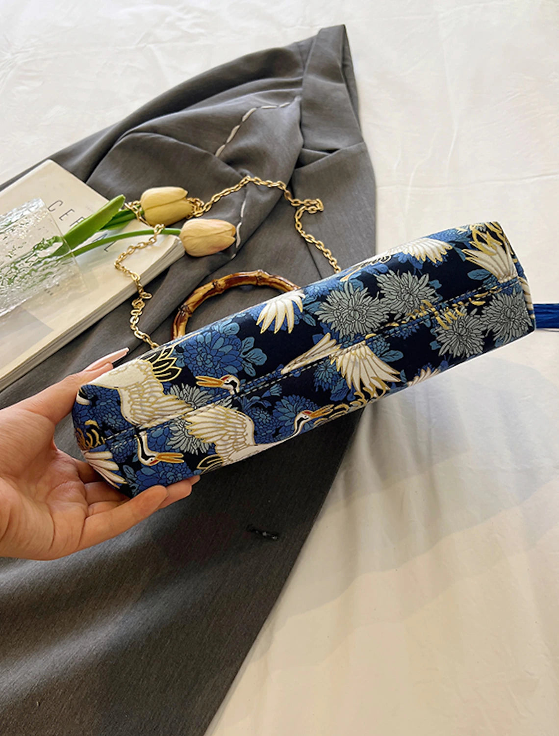Women's evening bag, side view, showing large capacity.