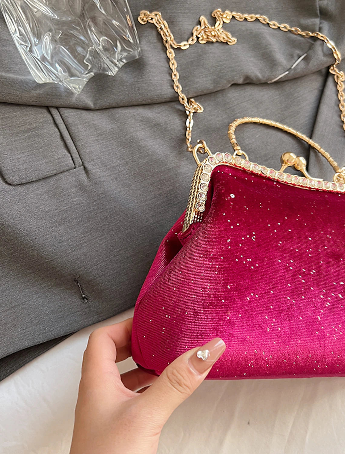 Close-up of the geometric pattern on the nylon clutch bag.