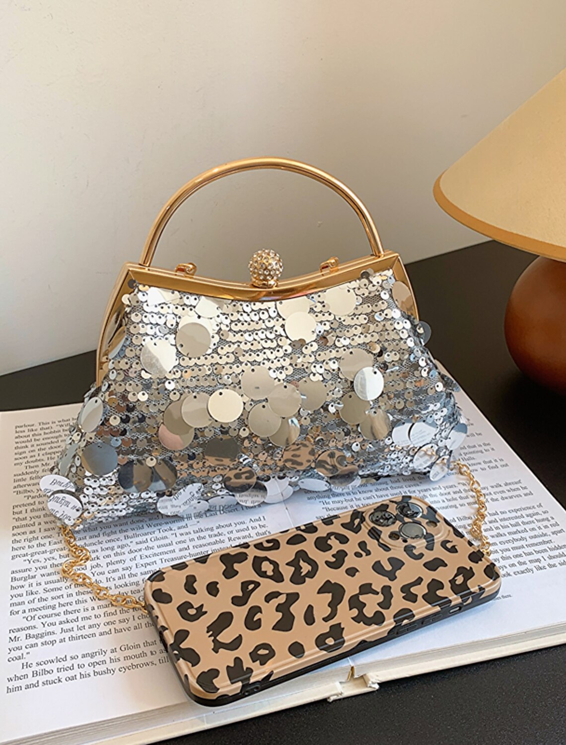 Women's geometric sequin tassel dome evening bag.