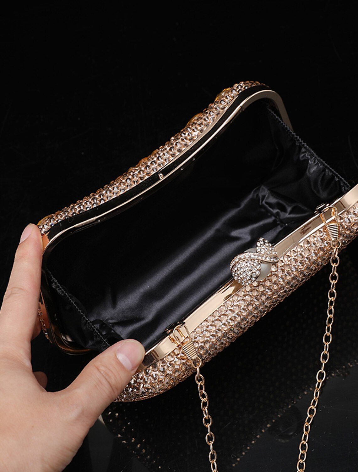 Women's glitter crystal clutch and matching purse set.