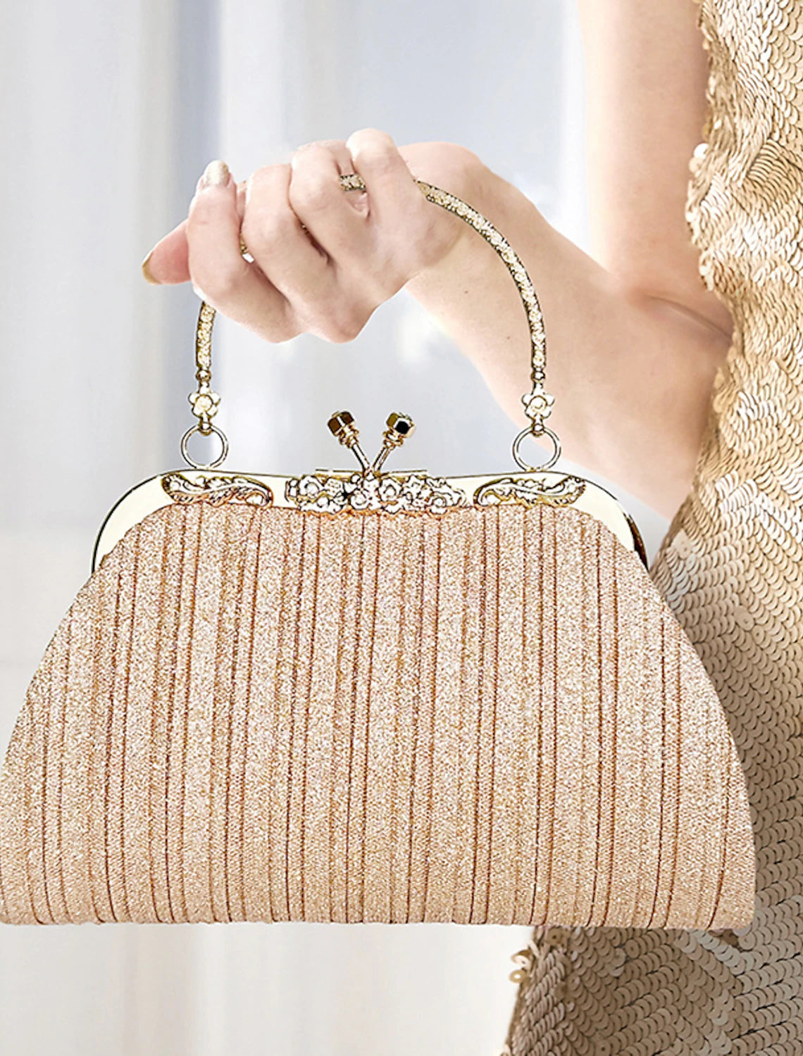 Women holding the elegant evening clutch bag.