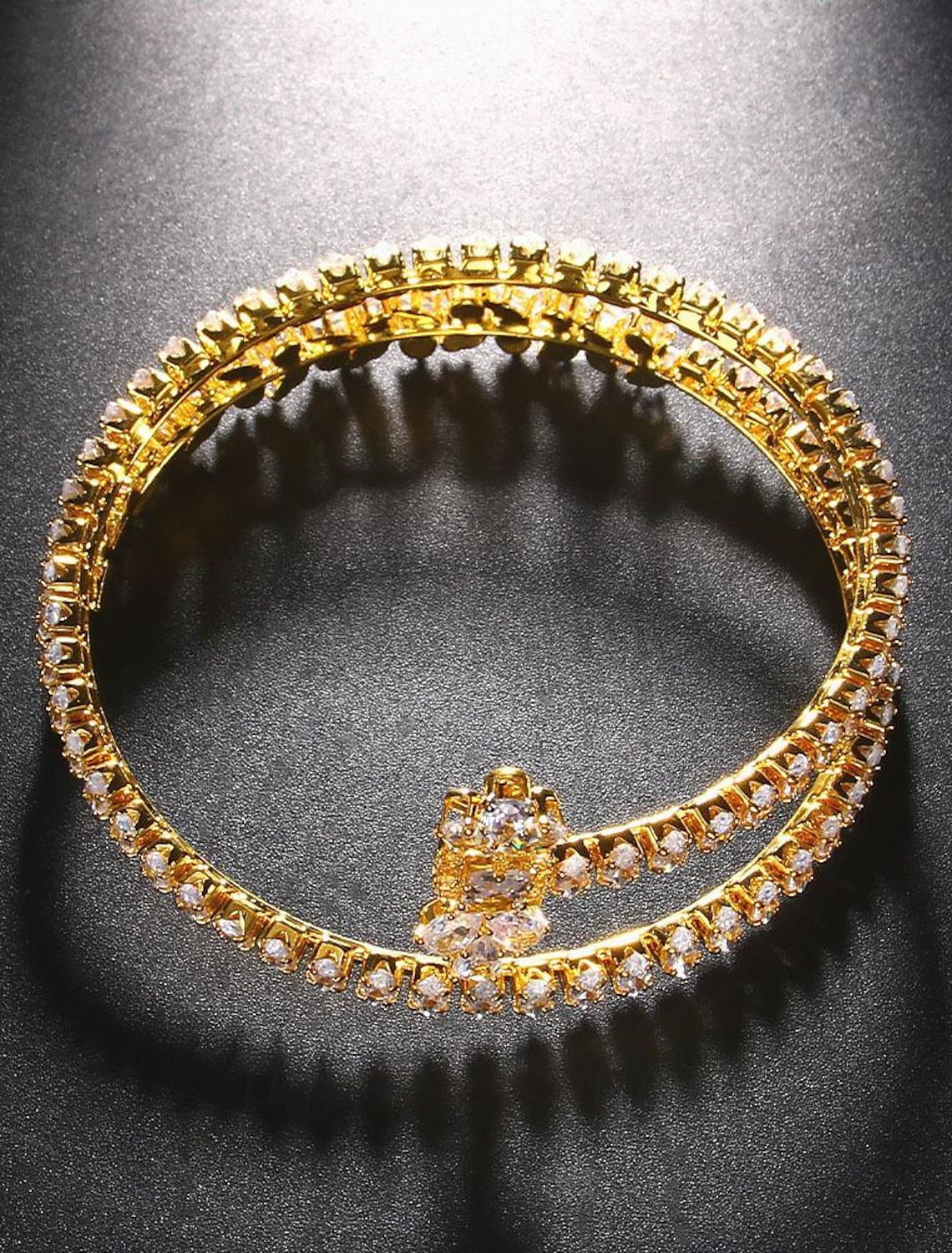 Elegant women's layered tennis bracelet worn on a wrist.