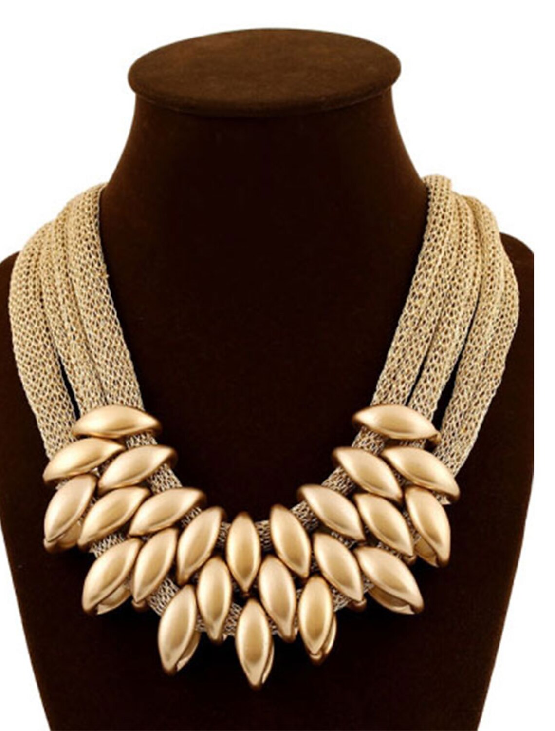 Woman wearing an elegant layered twisted bib necklace.