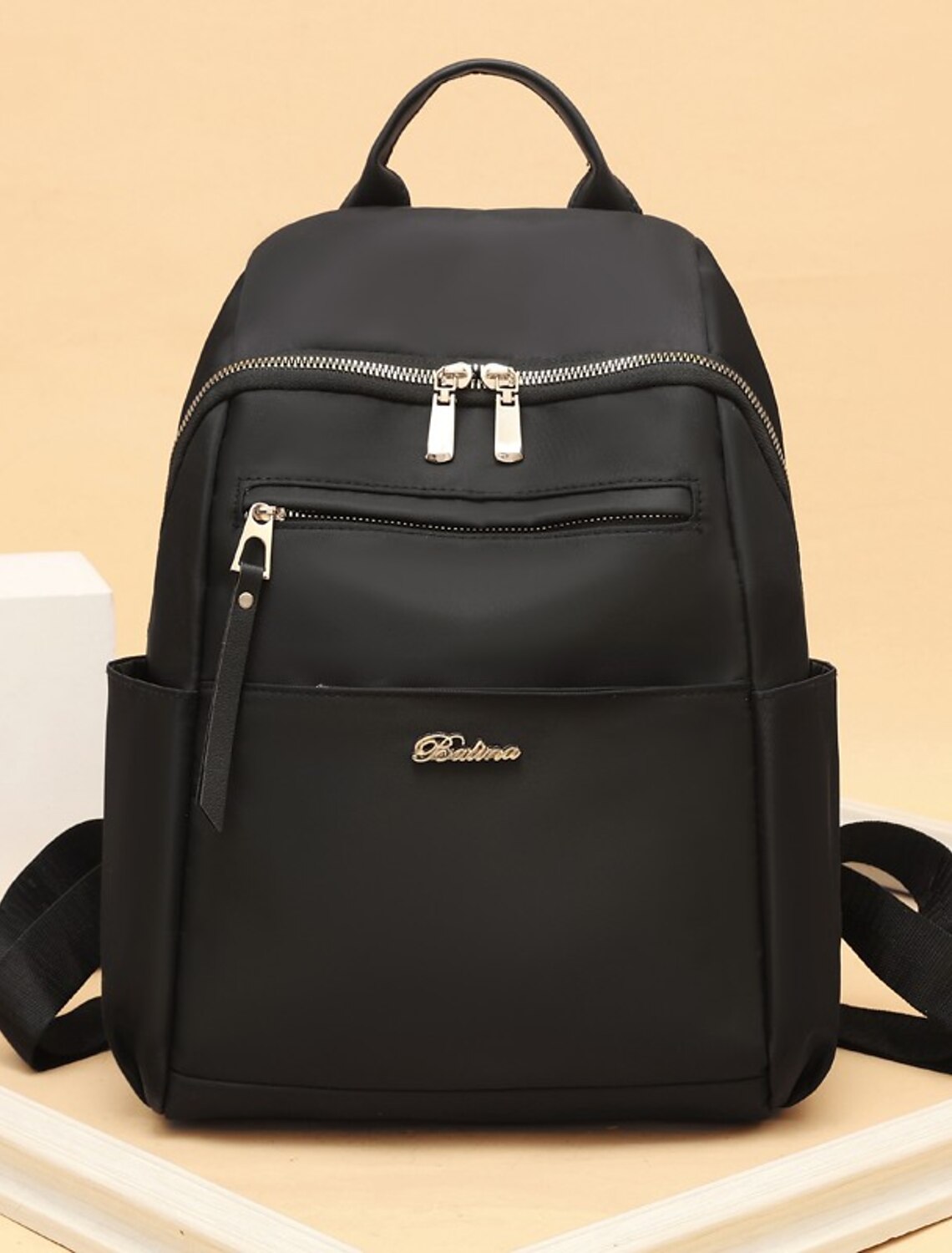 Women's Oxford Cloth backpack in red, showcasing its durable design and adjustable straps.