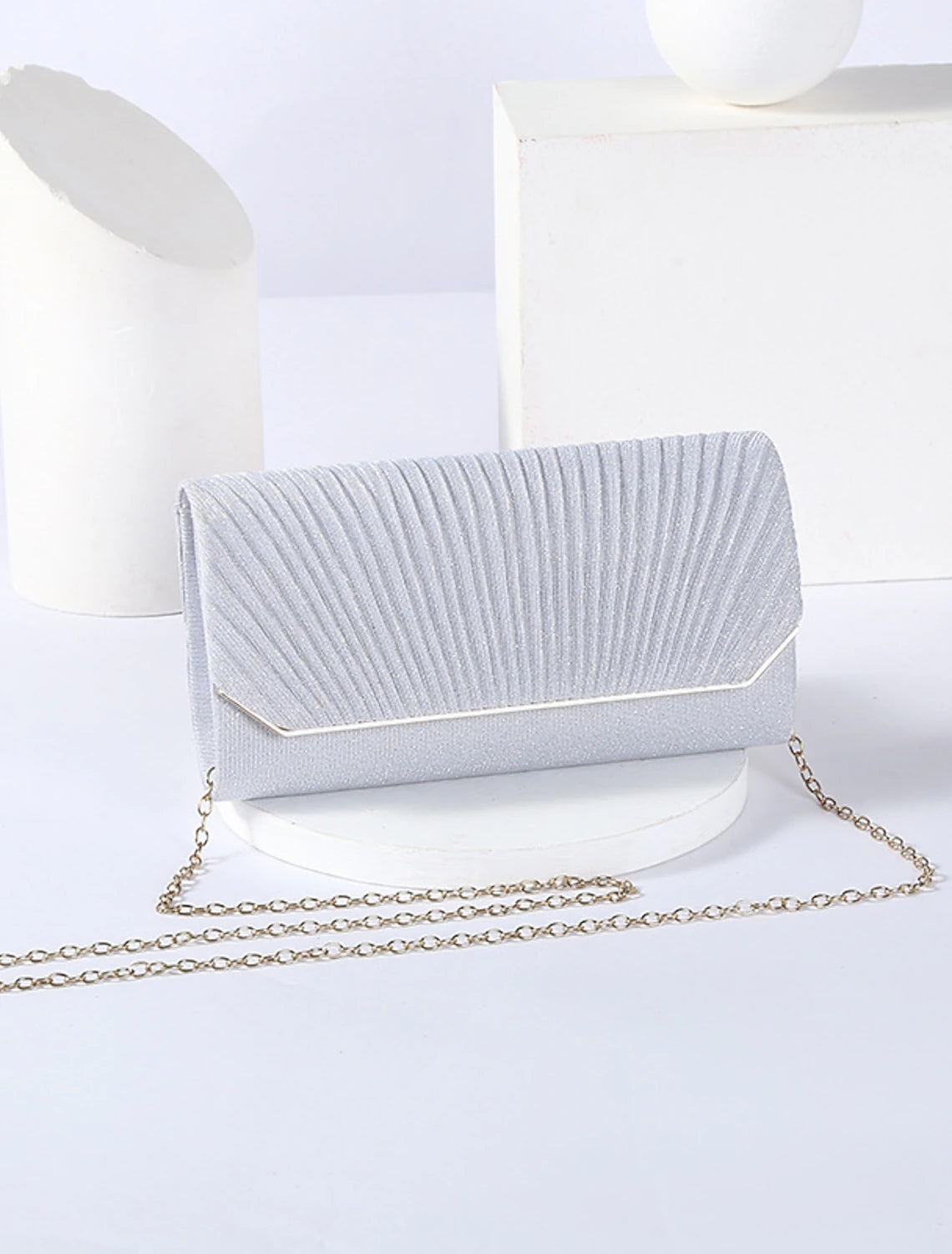 Front view of a black PU leather wristlet clutch bag.
