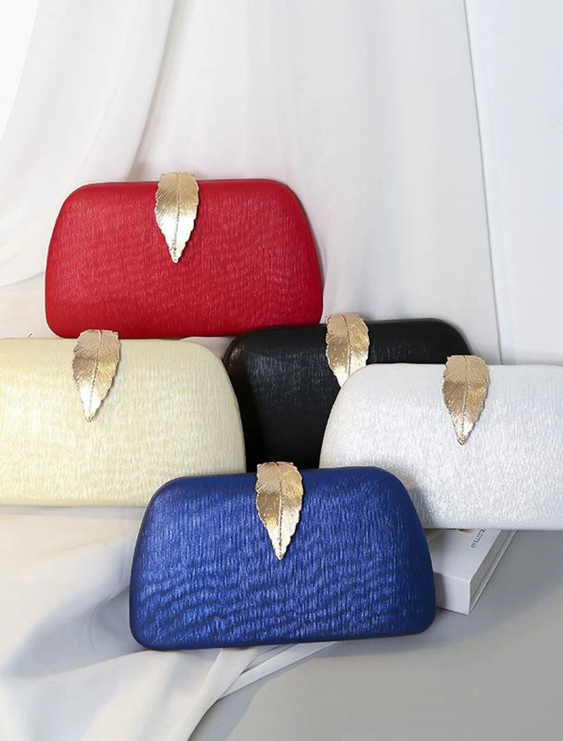 Women's polyester clutch evening bag with buckle chain.