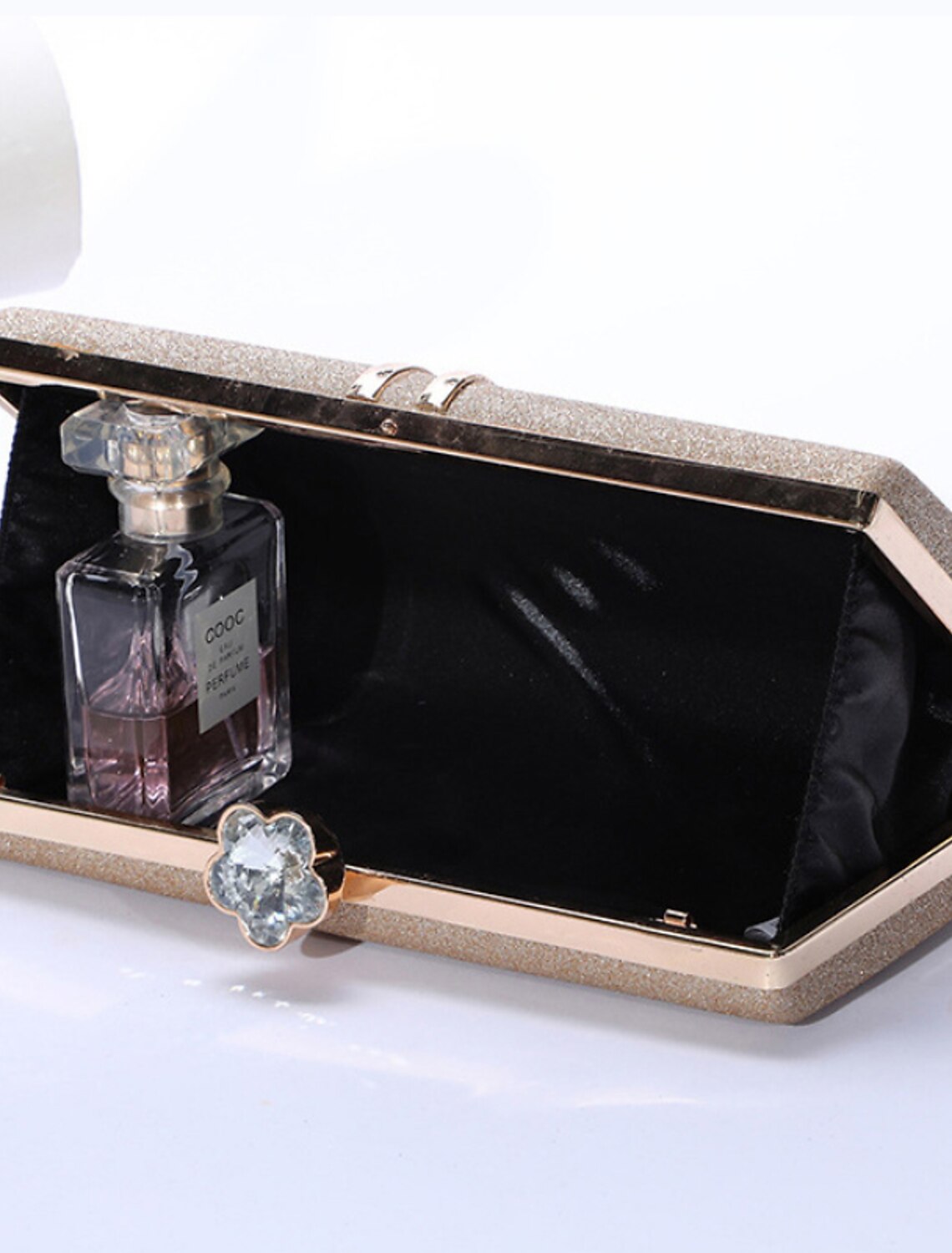 Interior view of the women's rhinestone clutch, showing ample space.
