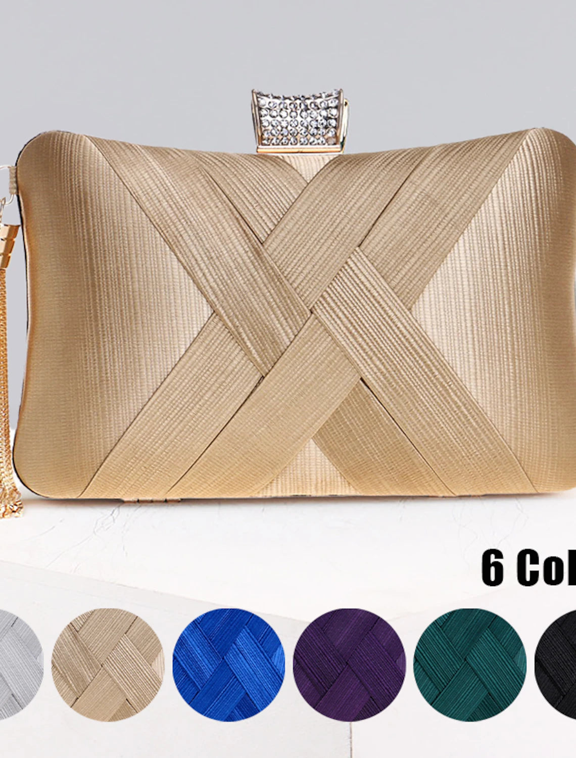 Women's silk evening clutch bag with tassel and chain.