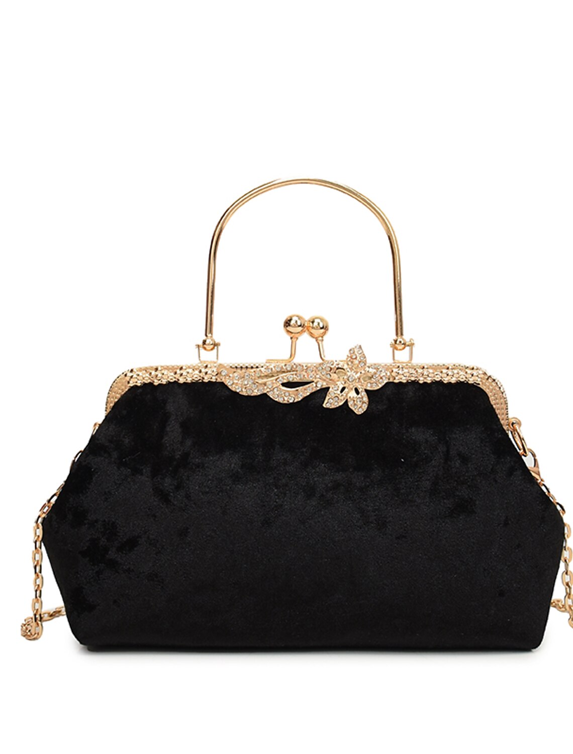 Close-up of the geometric pattern on a dark velvet evening bag.