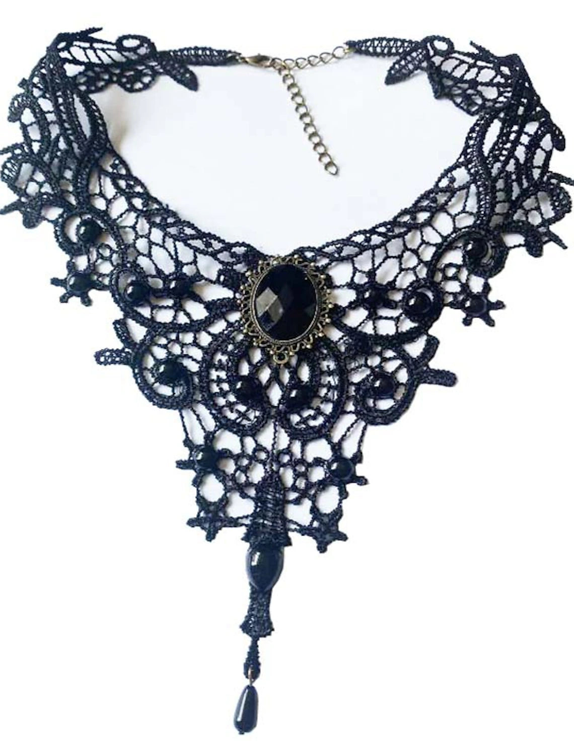 Woman wearing a black vintage lace necklace with acrylic details.