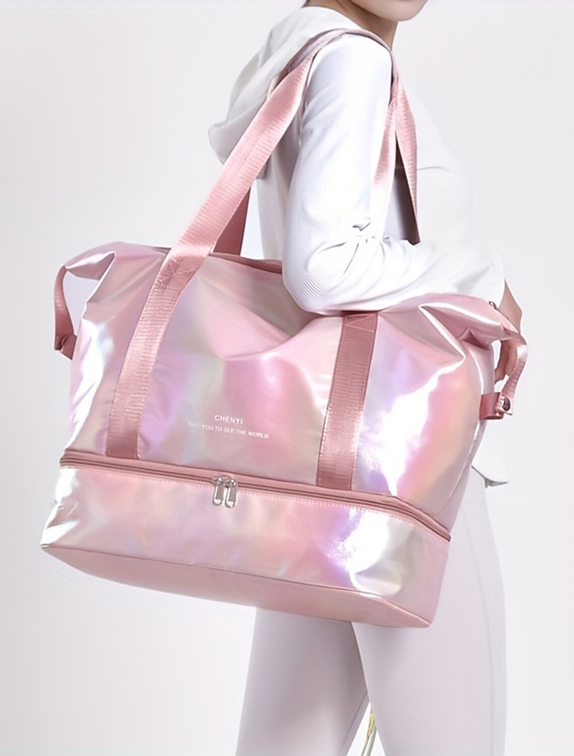 Women's expandable duffle crossbody bag in white, shown in its compact form.