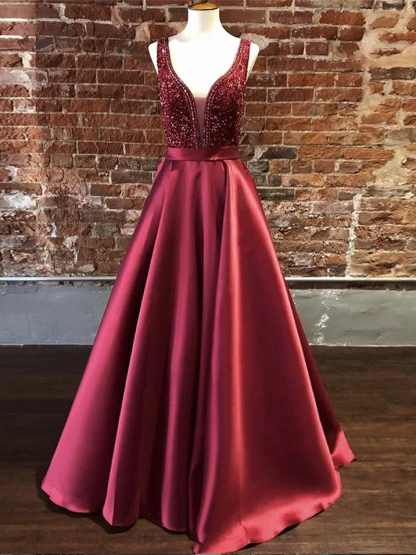 Lange Ballkleider mit V-Ausschnitt und Perlenbesatz