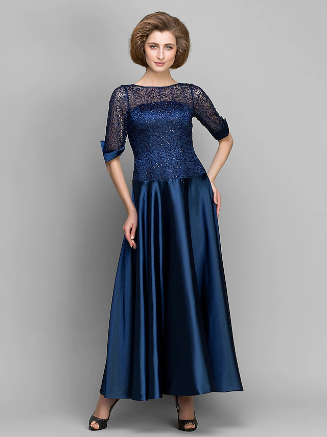 Elegant A-Line Mother of the Bride dress with bateau neck and half sleeves.