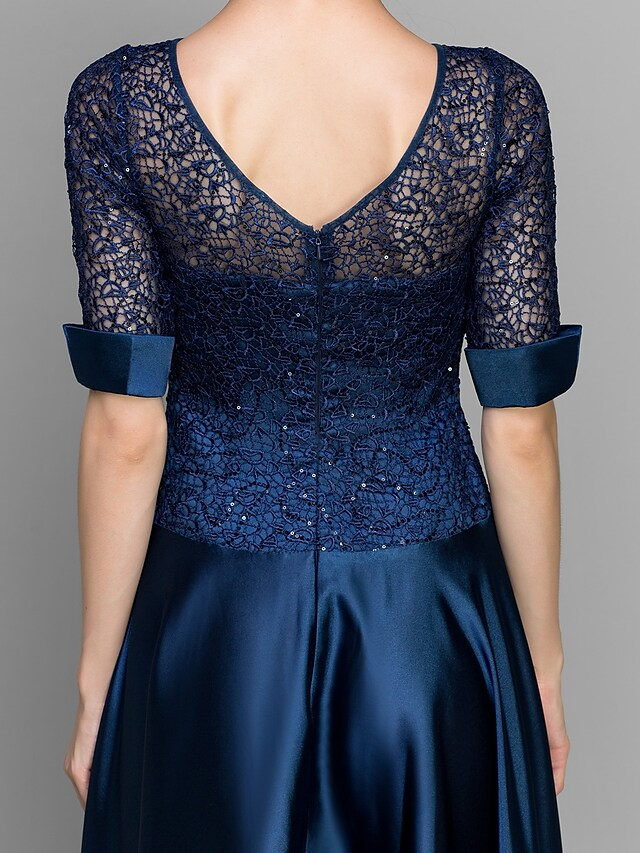Side view of A-Line satin lace dress with pleats.