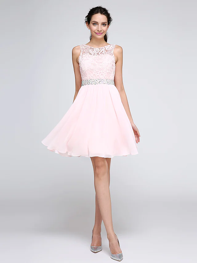 Elegant A-Line short mini cocktail dress with illusion neckline and crystal lace details.